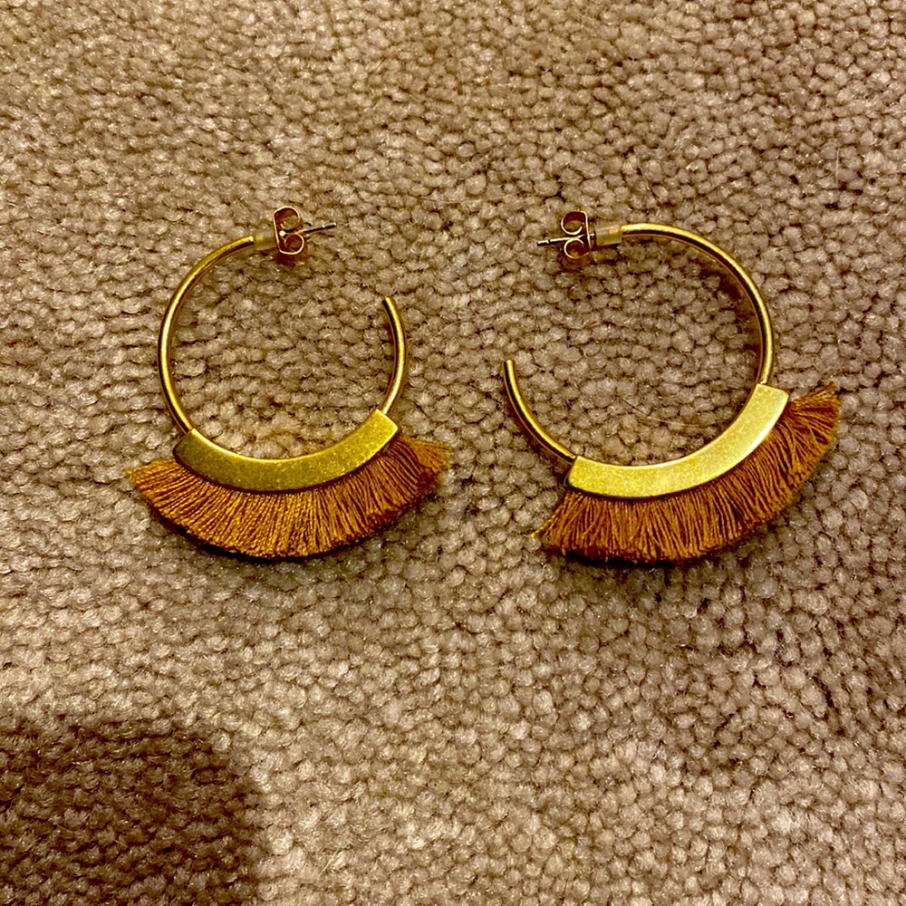 Gold hoop earrings with fringe